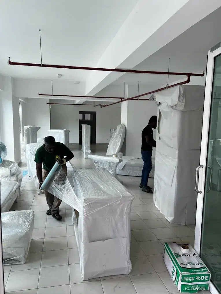 Professional office movers handling an office relocation in Malaysia